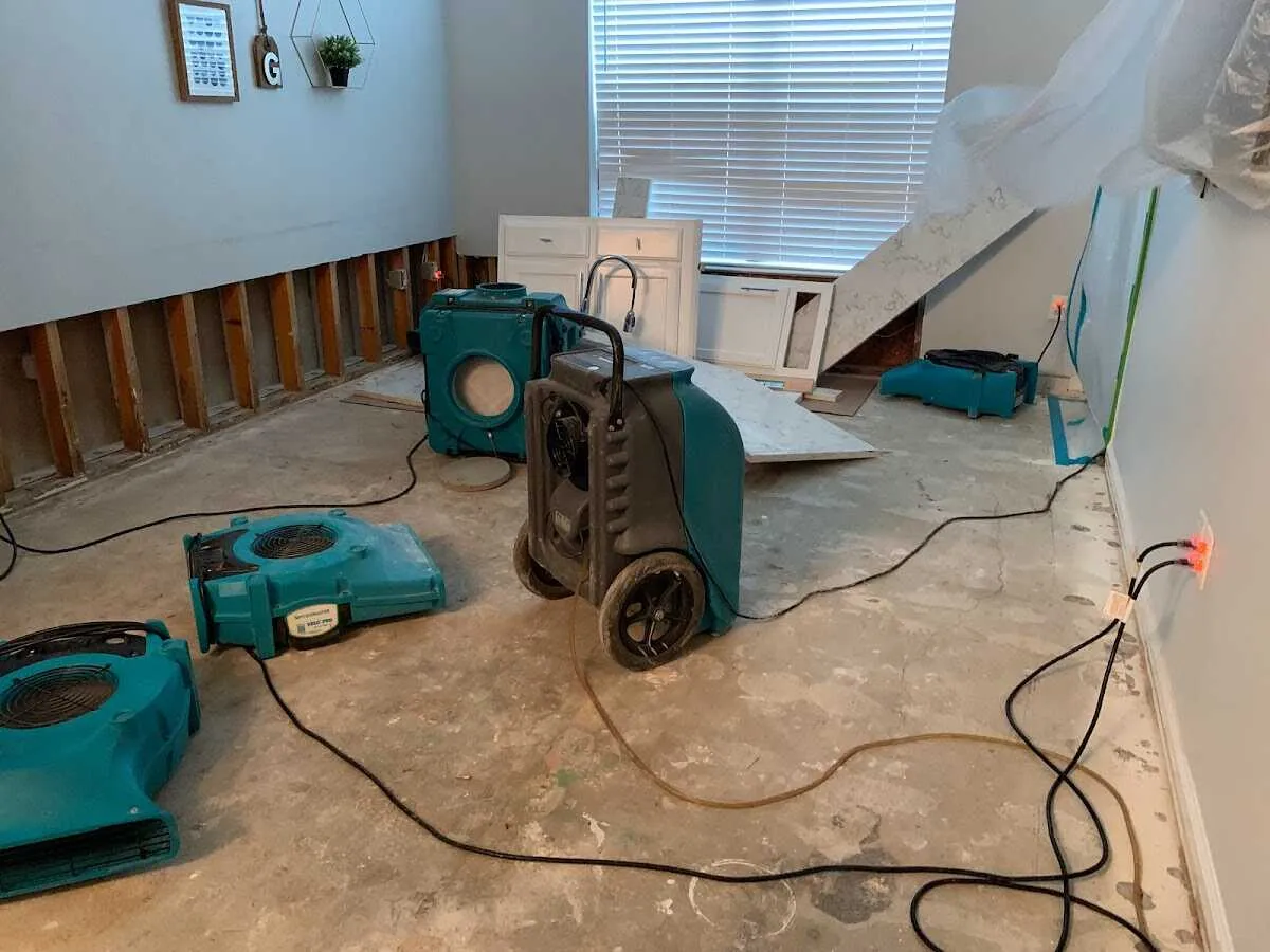 Dehumidifier in flood-cut room for Water Damage Restoration in Clarksville